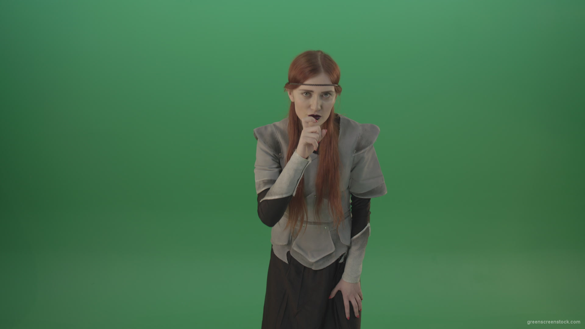 Dressed-Witch-Girl-in-medieval-costume-showing-quit-sign-emotion-with-finger-isolated-on-green-screen_008 Green Screen Stock
