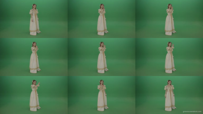 Flips-touchscreen-in-a-white-suit-of-a-medieval-woman-isolated-on-green-screen Green Screen Stock