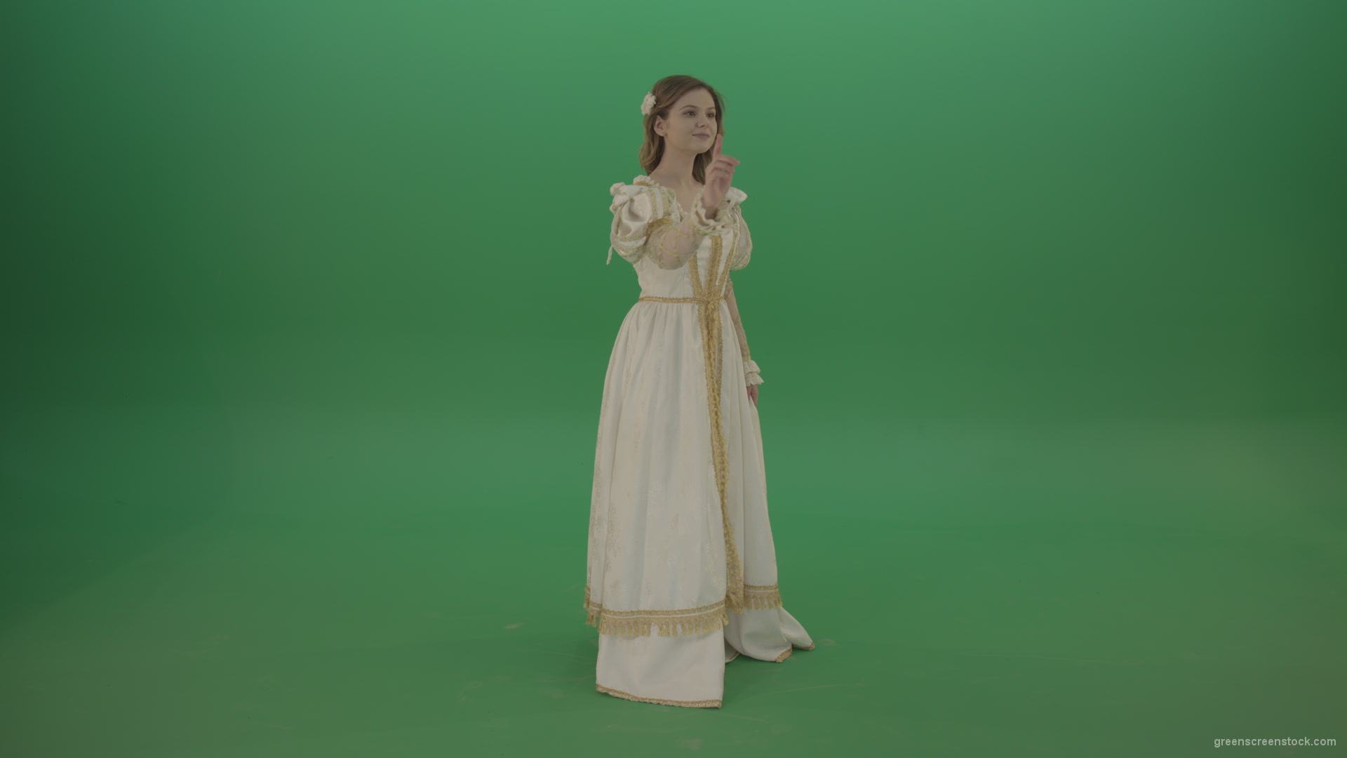 Flips-touchscreen-in-a-white-suit-of-a-medieval-woman-isolated-on-green-screen_002 Green Screen Stock