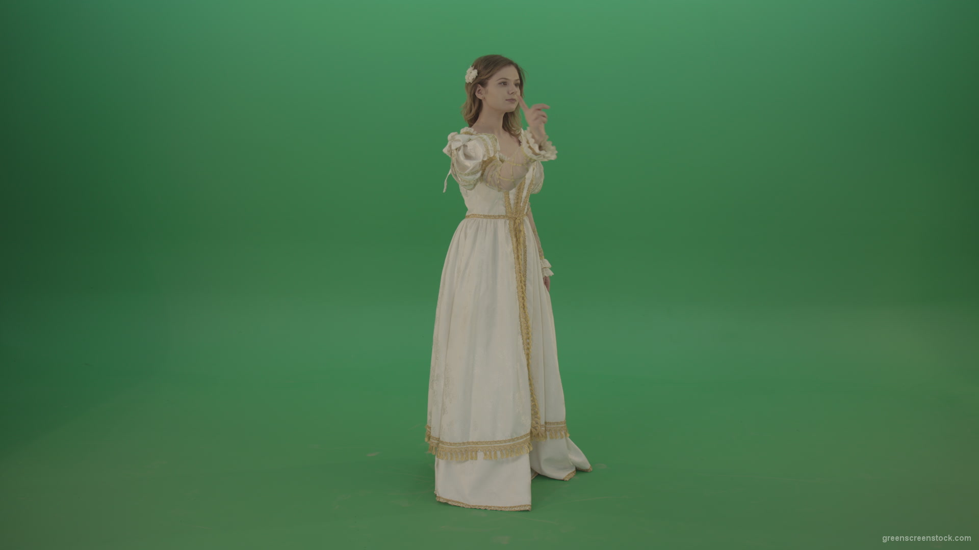 Flips-touchscreen-in-a-white-suit-of-a-medieval-woman-isolated-on-green-screen_005 Green Screen Stock