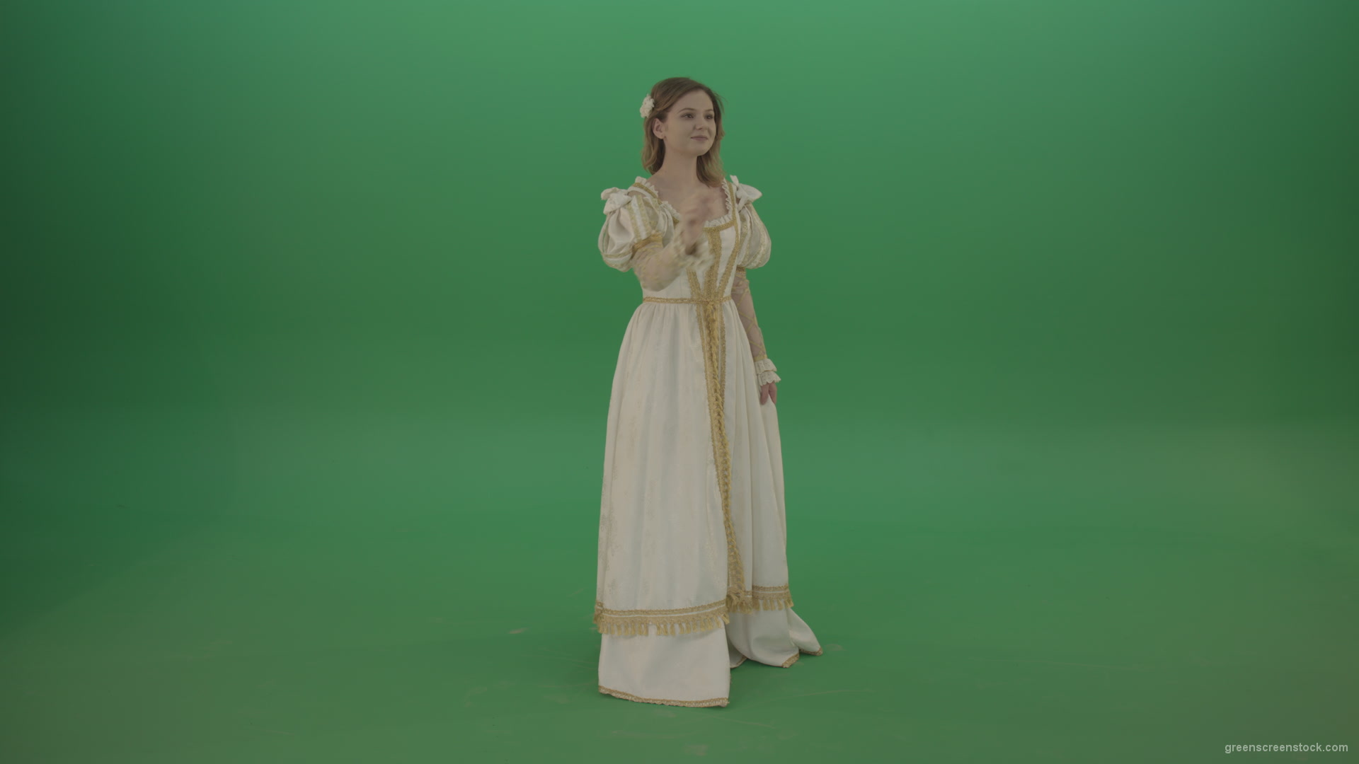 Flips-touchscreen-in-a-white-suit-of-a-medieval-woman-isolated-on-green-screen_008 Green Screen Stock