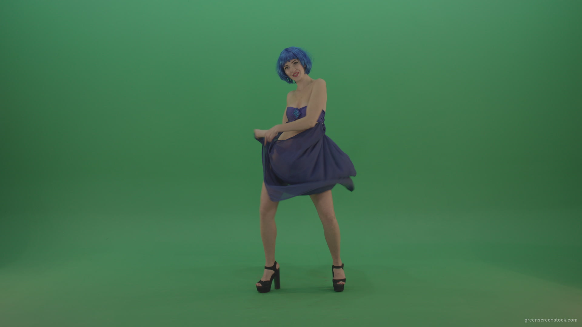 Full-size-erotic-young-girl-dancing-go-go-with-blue-dress-curtain-on-green-screen-1_001 Green Screen Stock