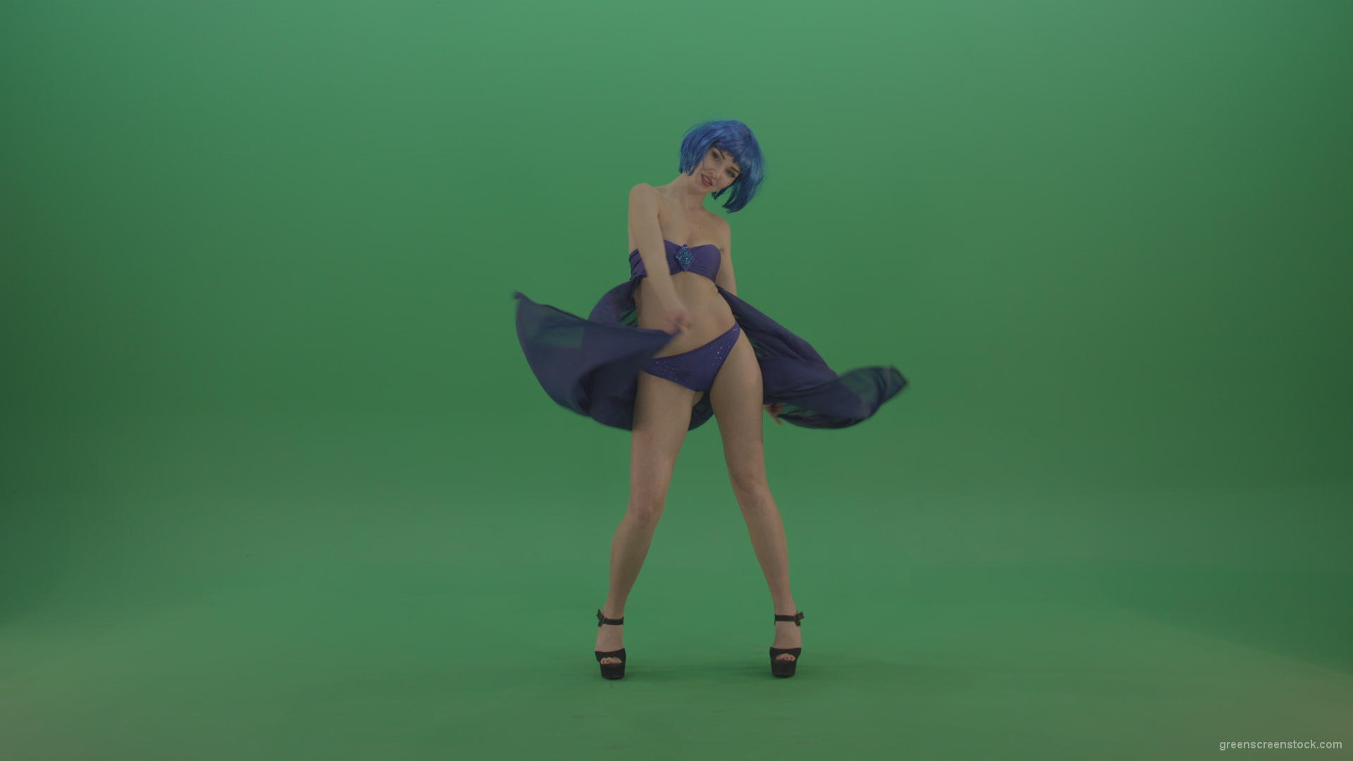 Full-size-erotic-young-girl-dancing-go-go-with-blue-dress-curtain-on-green-screen-1_002 Green Screen Stock