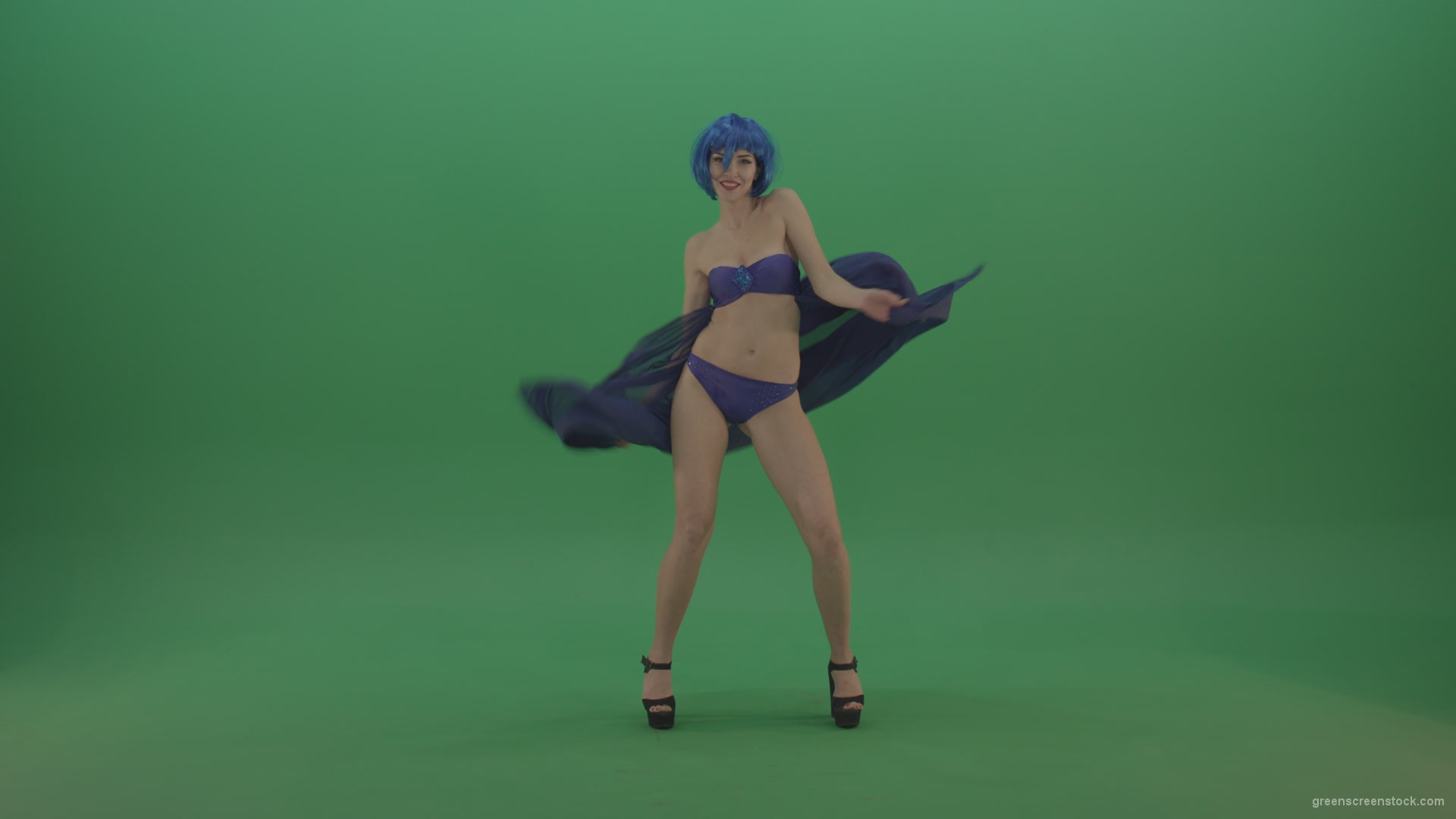 Full-size-erotic-young-girl-dancing-go-go-with-blue-dress-curtain-on-green-screen-1_004 Green Screen Stock