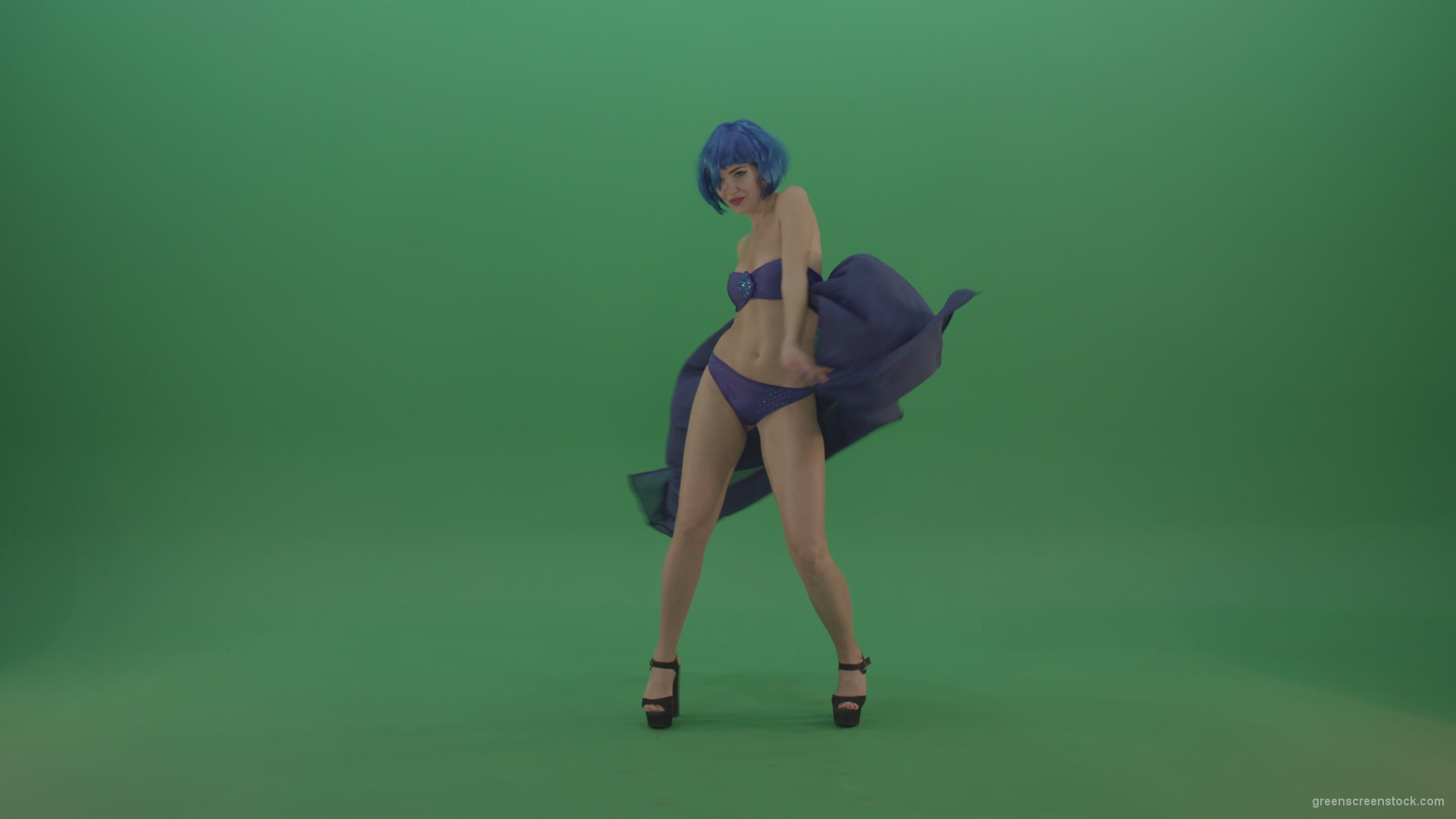 Full-size-erotic-young-girl-dancing-go-go-with-blue-dress-curtain-on-green-screen-1_005 Green Screen Stock