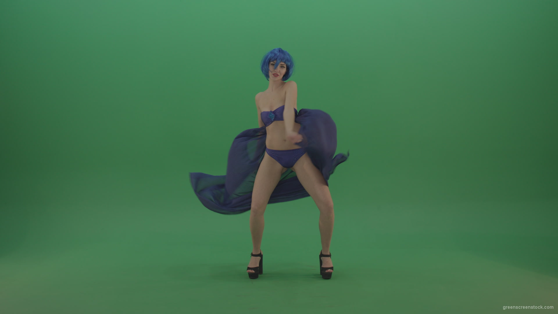 Full-size-erotic-young-girl-dancing-go-go-with-blue-dress-curtain-on-green-screen-1_006 Green Screen Stock