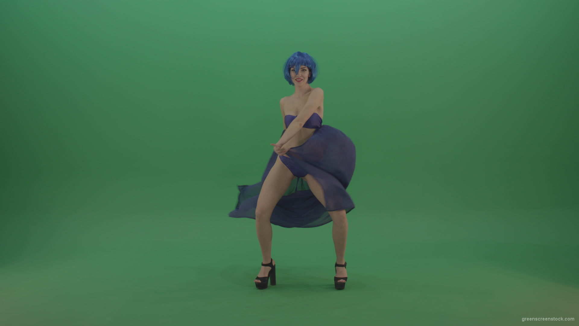 Full-size-erotic-young-girl-dancing-go-go-with-blue-dress-curtain-on-green-screen-1_009 Green Screen Stock