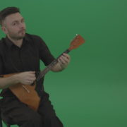 Funny-Balalaika-music-player-in-black-wear-playing-in-wedding-isolated-on-green-screen-background_002 Green Screen Stock