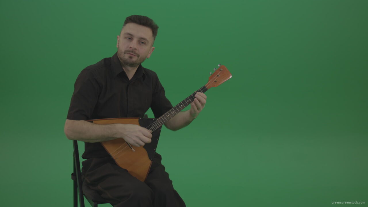 vj video background Funny-Balalaika-music-player-in-black-wear-playing-in-wedding-isolated-on-green-screen-background_003