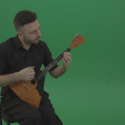 Funny-Balalaika-music-player-in-black-wear-playing-in-wedding-isolated-on-green-screen-background_006 Green Screen Stock