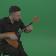 Funny-Balalaika-music-player-in-black-wear-playing-in-wedding-isolated-on-green-screen-background_008 Green Screen Stock