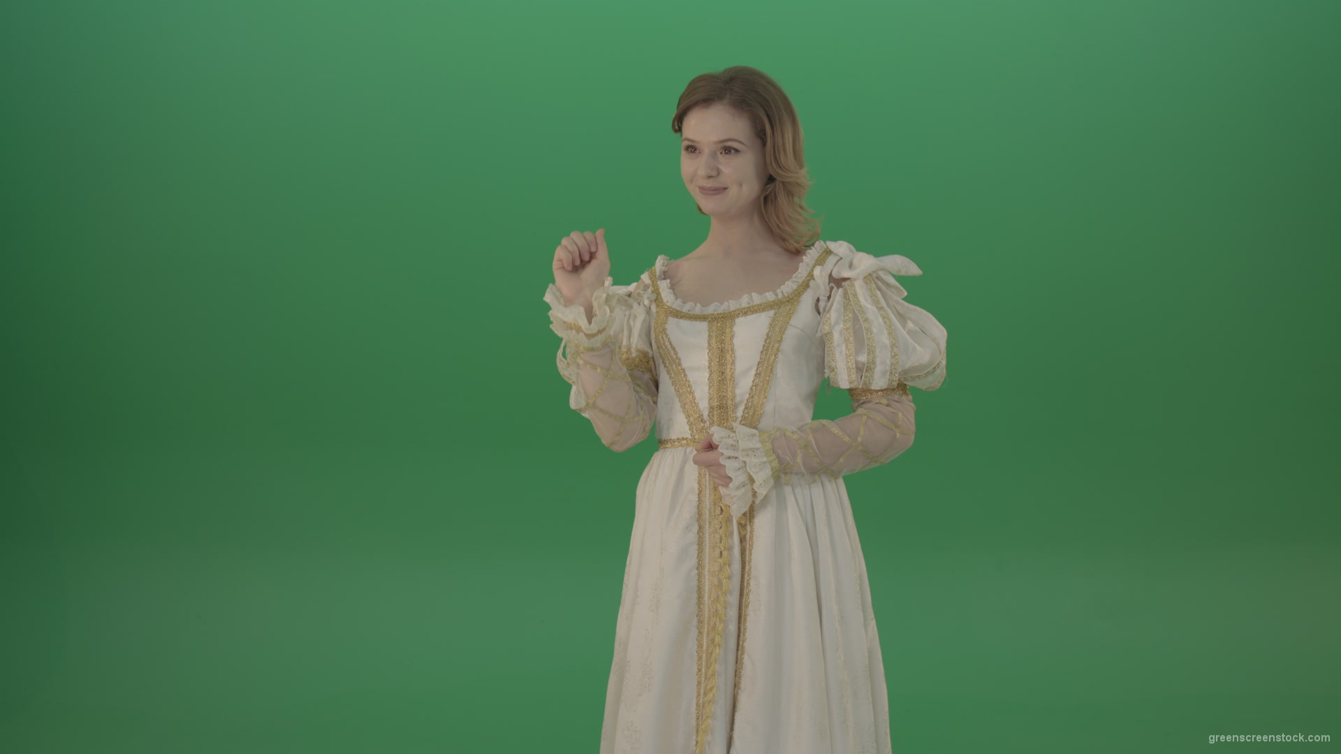 Girl-flips-a-virtual-screen-dressed-in-a-medieval-costume-isolated-on-green-screen_008 Green Screen Stock