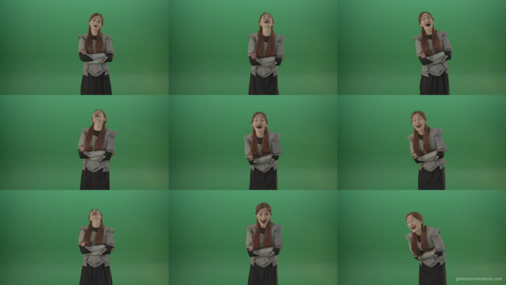 Girl-in-a-medieval-wig-costume-laughs-on-a-green-background-1 Green Screen Stock