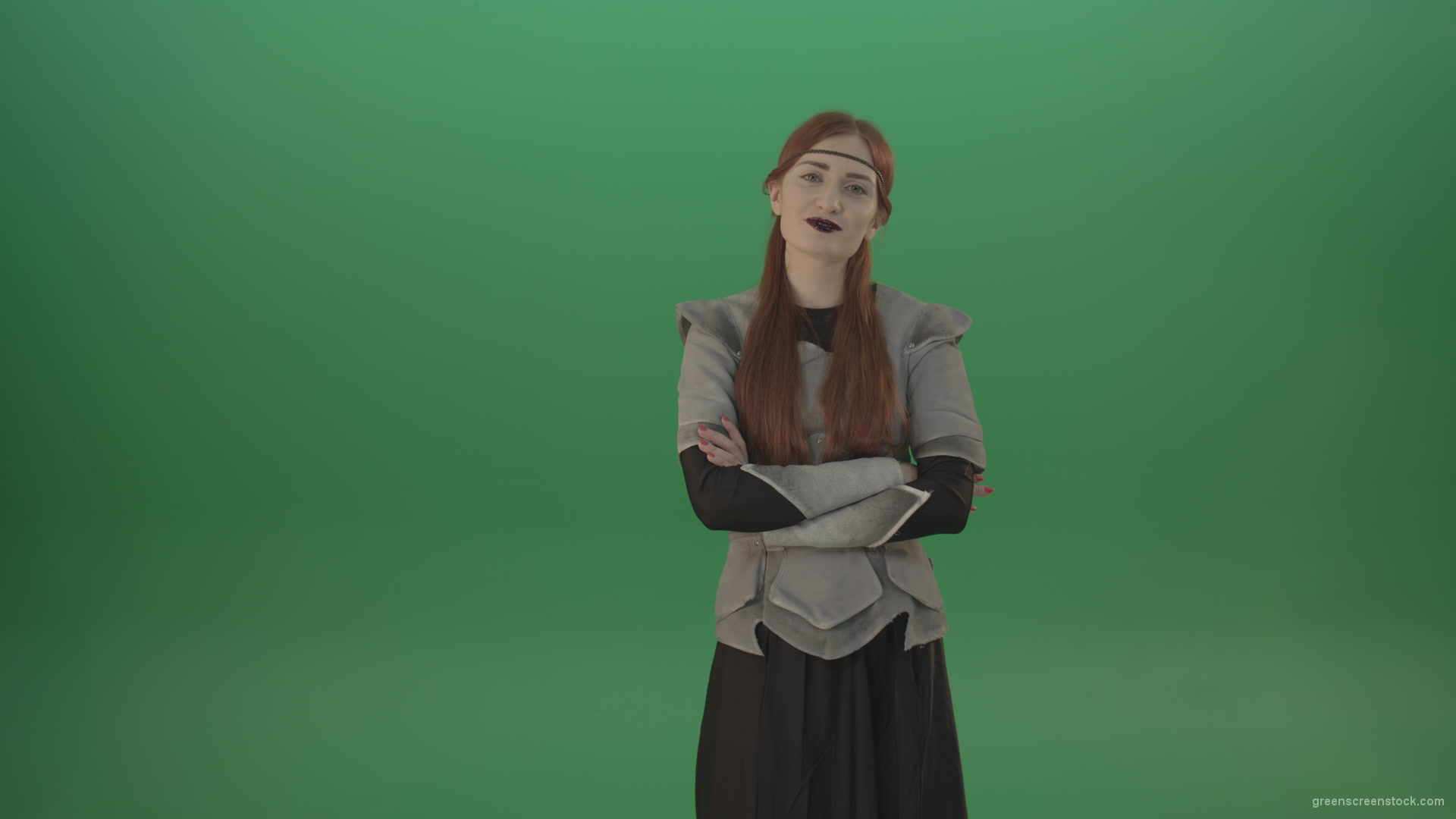 Girl-in-a-medieval-wig-costume-laughs-on-a-green-background-1_001 Green Screen Stock