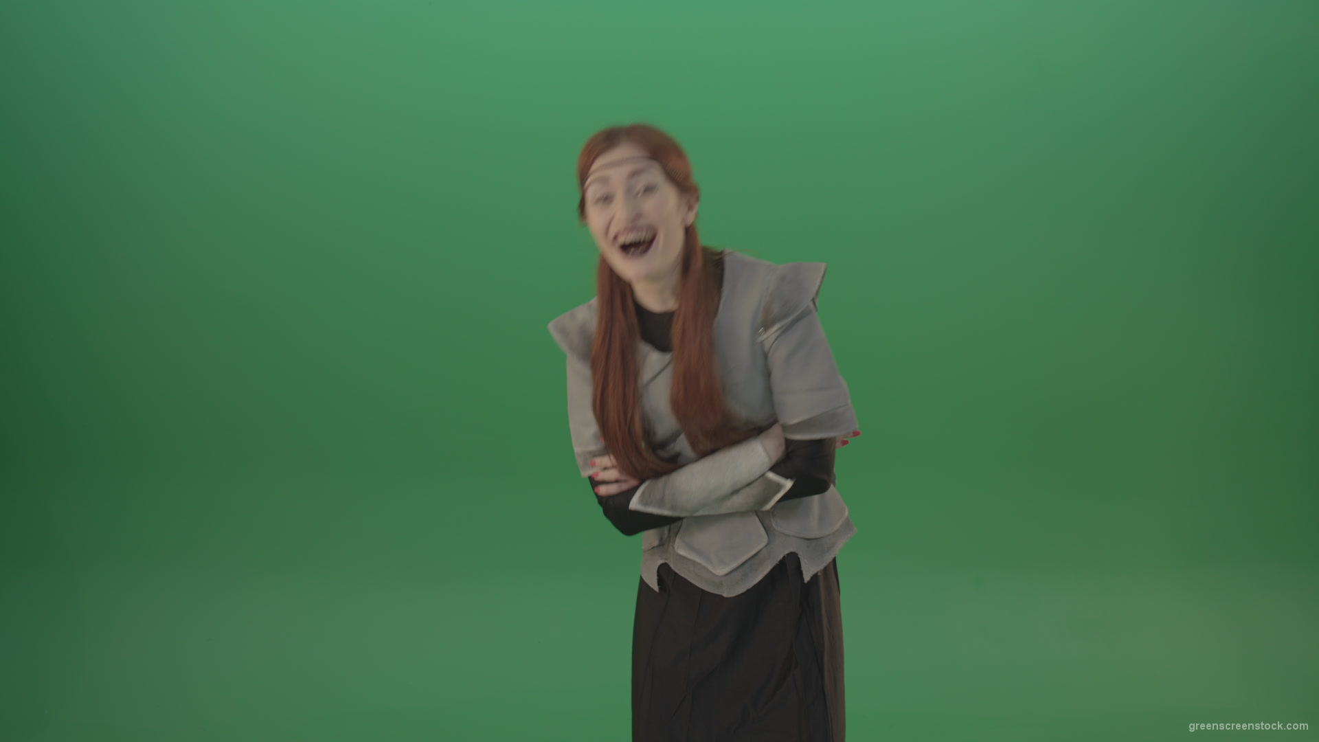 Girl-in-a-medieval-wig-costume-laughs-on-a-green-background-1_006 Green Screen Stock