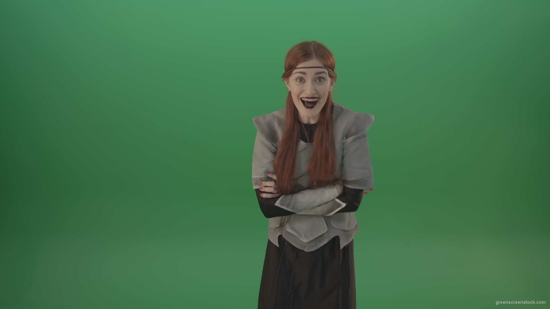 Girl-in-a-medieval-wig-costume-laughs-on-a-green-background-1_008 Green Screen Stock