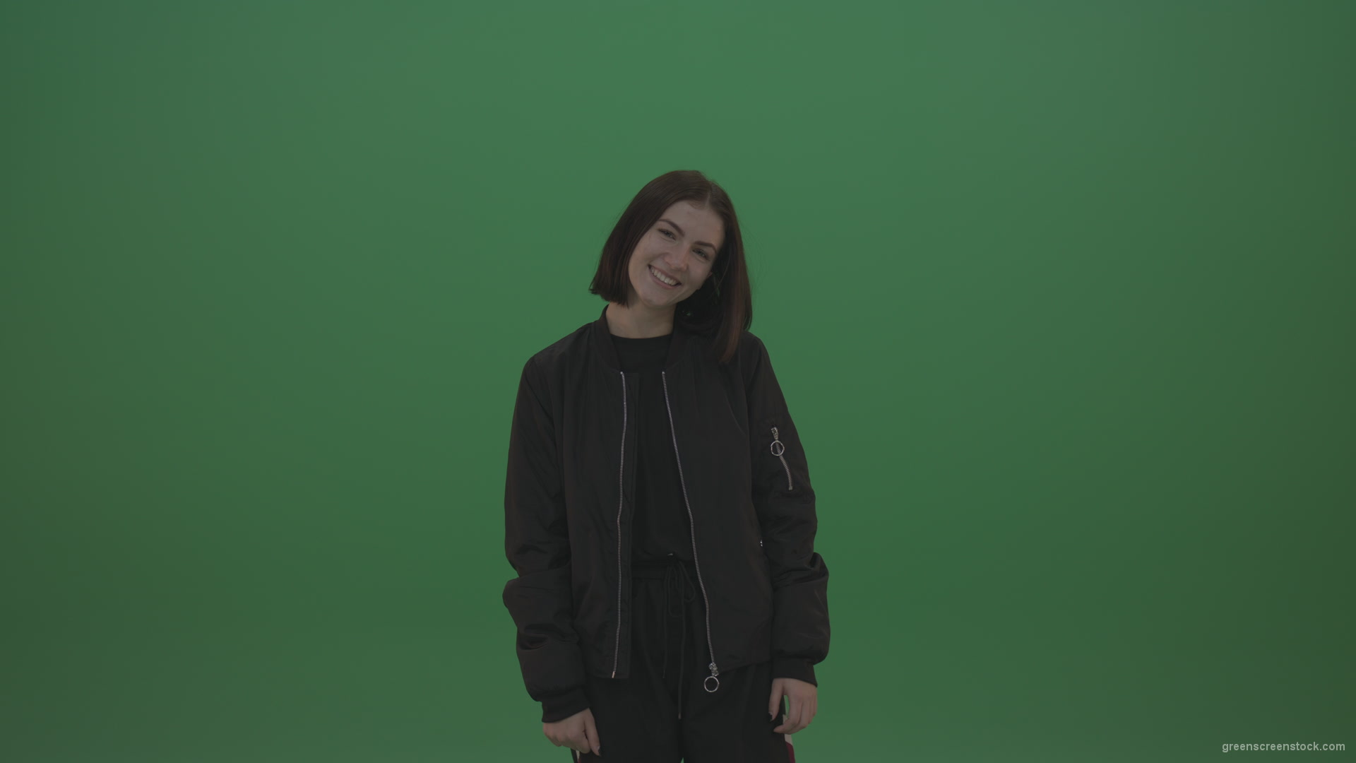 Girl-in-black-wear-smiles-as-she-poses-over-chromakey-background_009 Green Screen Stock