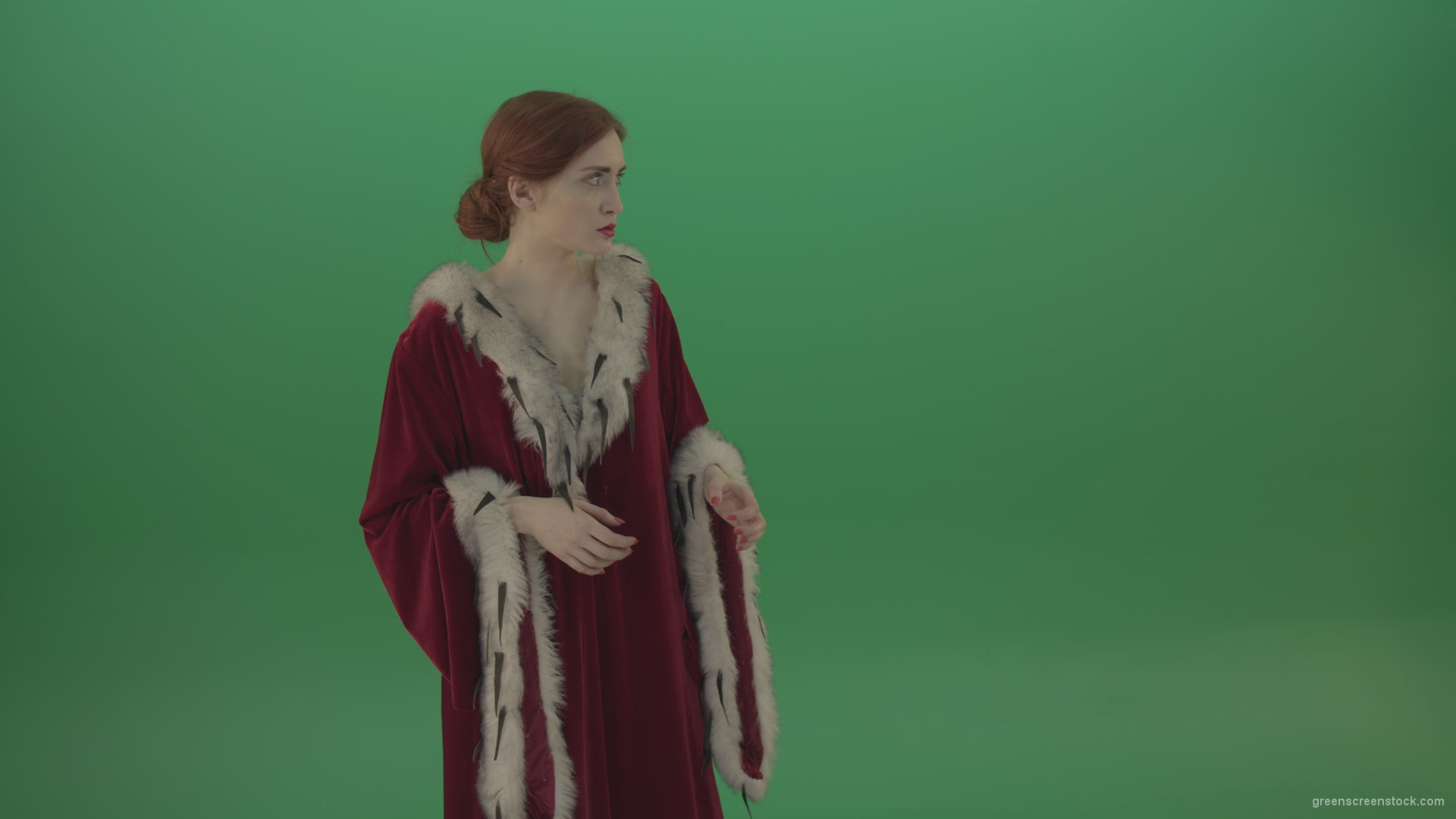 Girl-is-dressed-in-a-red-cloak-shoots-proton-lasers-_001 Green Screen Stock