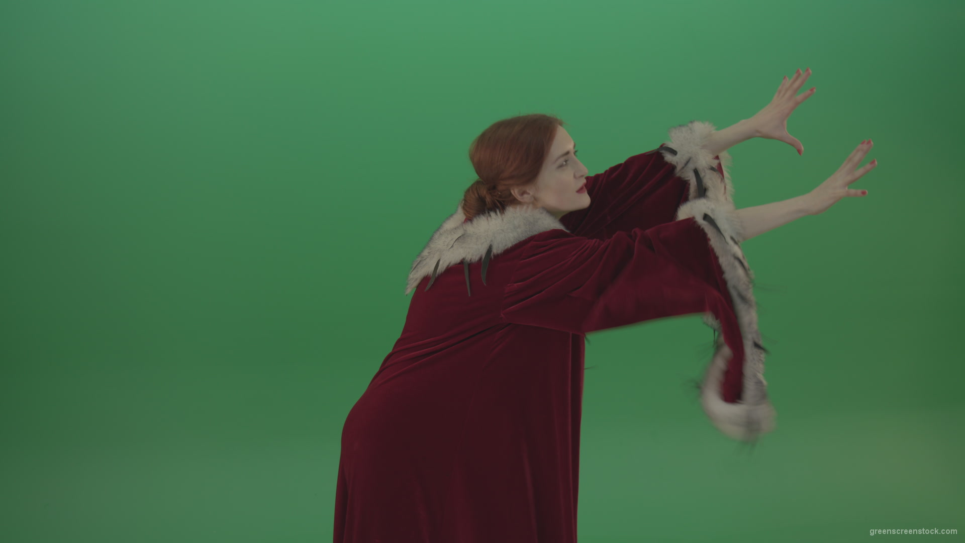 Girl-is-dressed-in-a-red-cloak-shoots-proton-lasers-_004 Green Screen Stock