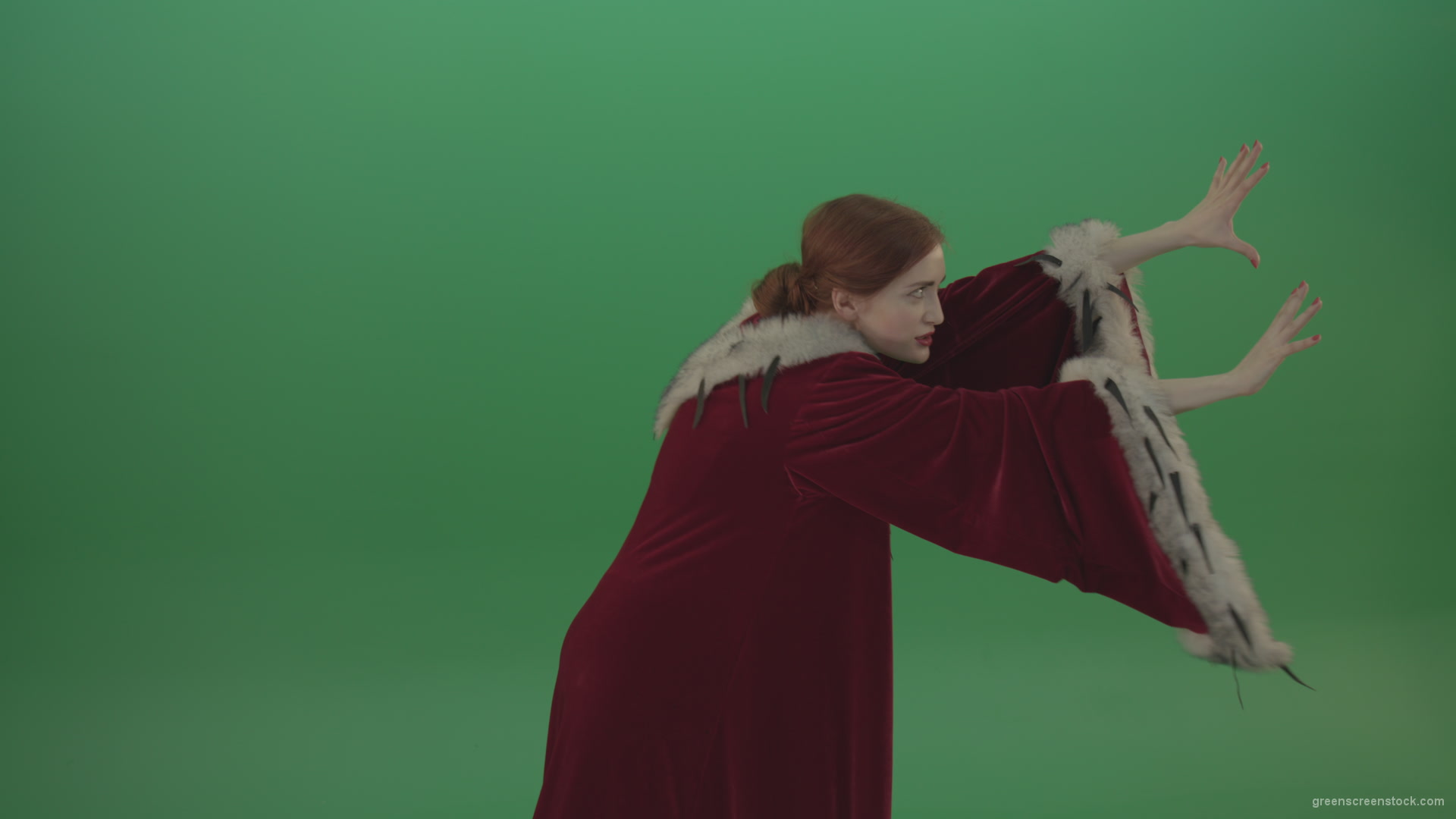 Girl-is-dressed-in-a-red-cloak-shoots-proton-lasers-_008 Green Screen Stock