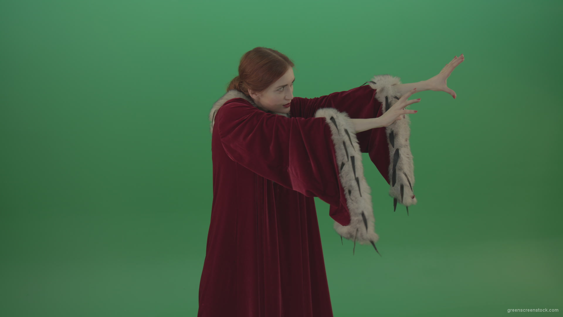 Girl-is-dressed-in-a-red-cloak-shoots-proton-lasers-_009 Green Screen Stock