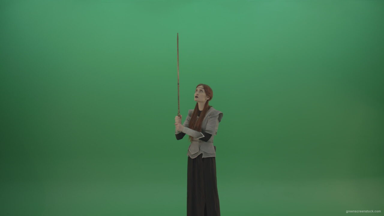 vj video background Girl-shouts-her-foes-on-an-offensive-raising-a-sword-up-on-a-green-background_003