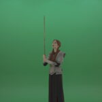 vj video background Girl-shouts-her-foes-on-an-offensive-raising-a-sword-up-on-a-green-background_003