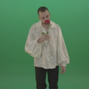 vj video background Glancing-at-the-red-flower-the-guy-gives-love-rose-to-camera-isolated-on-green-screen_003