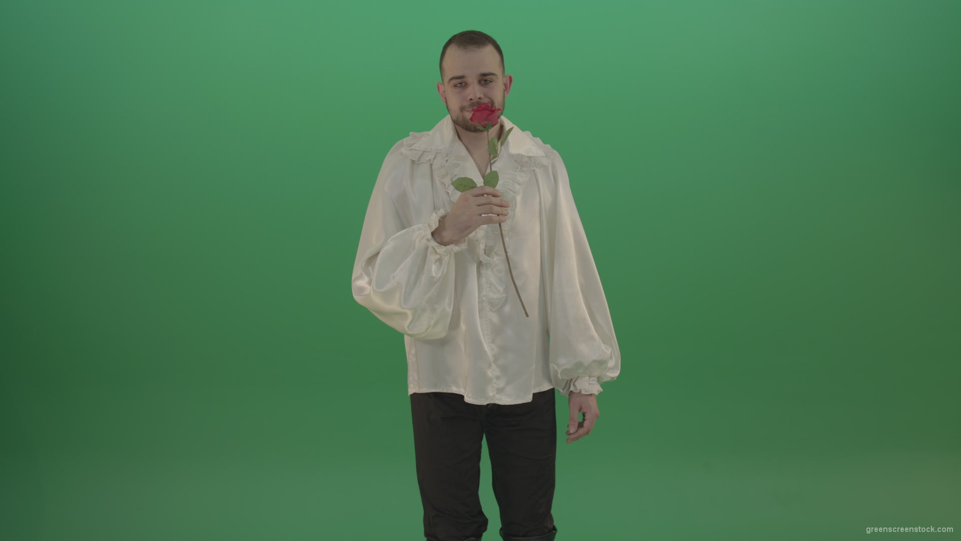 Glancing-at-the-red-flower-the-guy-gives-love-rose-to-camera-isolated-on-green-screen_005 Green Screen Stock