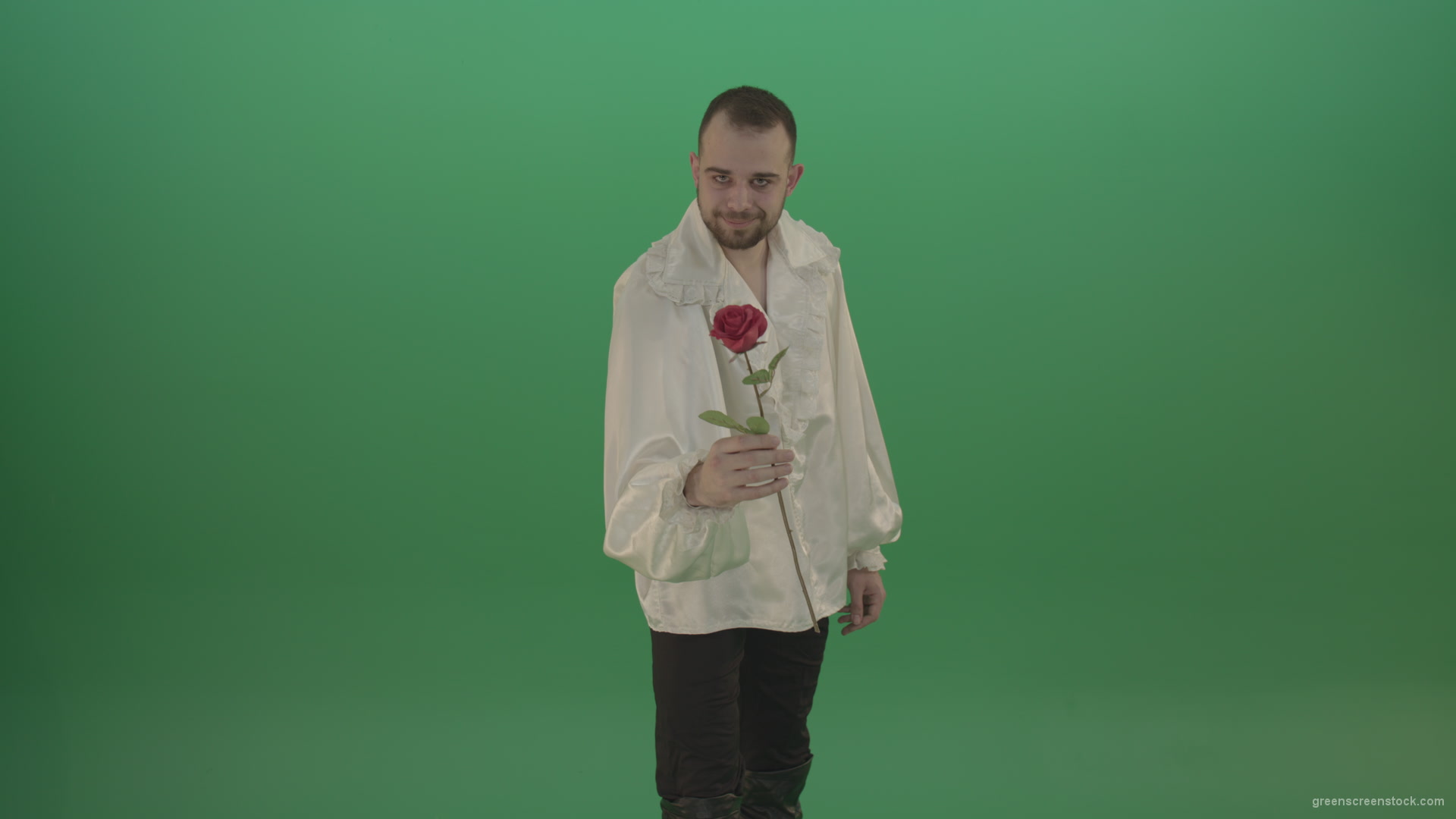 Glancing-at-the-red-flower-the-guy-gives-love-rose-to-camera-isolated-on-green-screen_007 Green Screen Stock