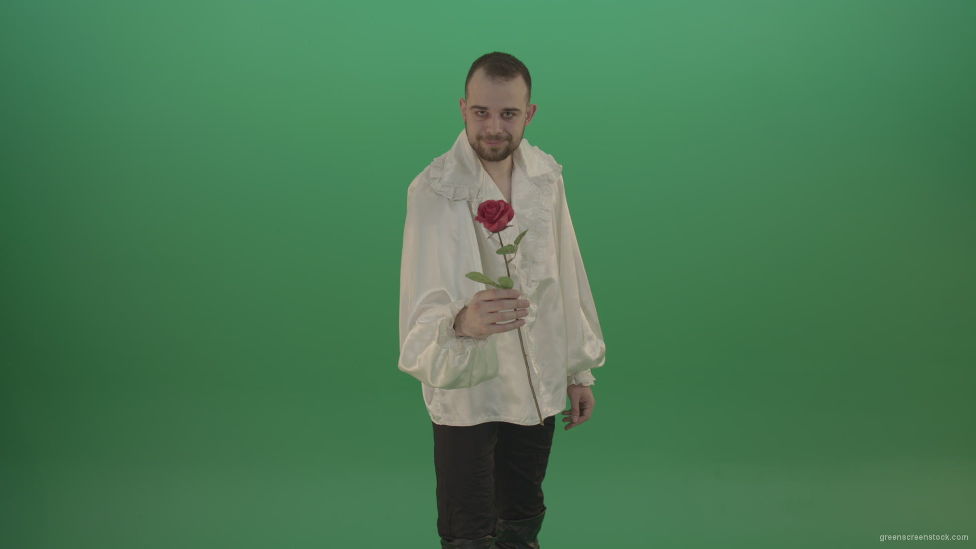Glancing-at-the-red-flower-the-guy-gives-love-rose-to-camera-isolated-on-green-screen_008 Green Screen Stock