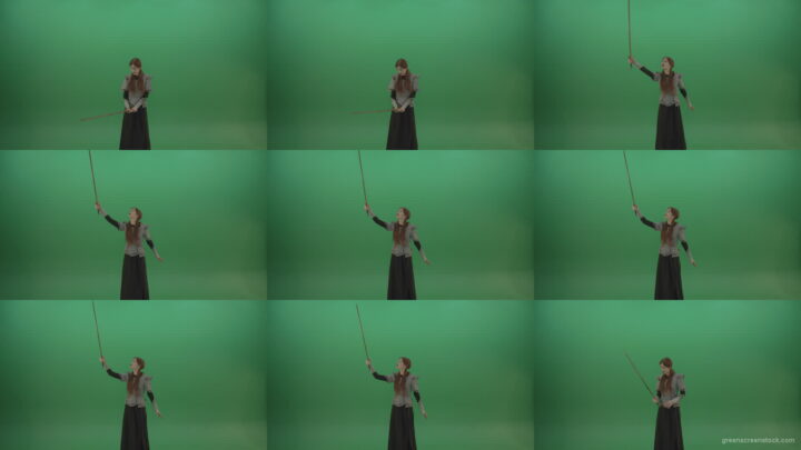 Great-sword-in-the-hands-of-a-mighty-warrior-girl-lifted-up-one-hand-on-a-green-background Green Screen Stock
