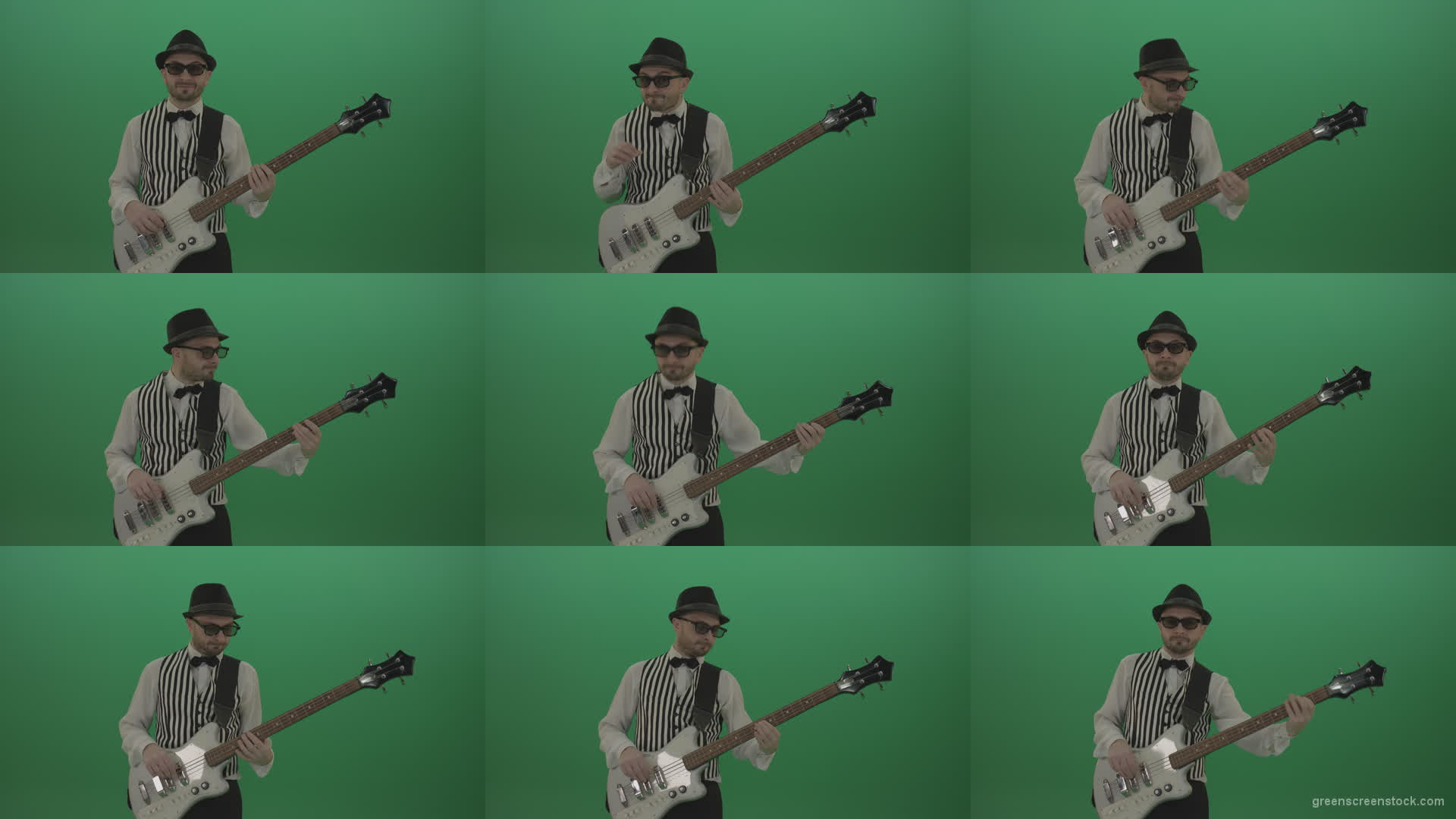Guitar-player-browses-the-bass-guitar-playing-solo-and-charismatically-shows-facial-expressions Green Screen Stock