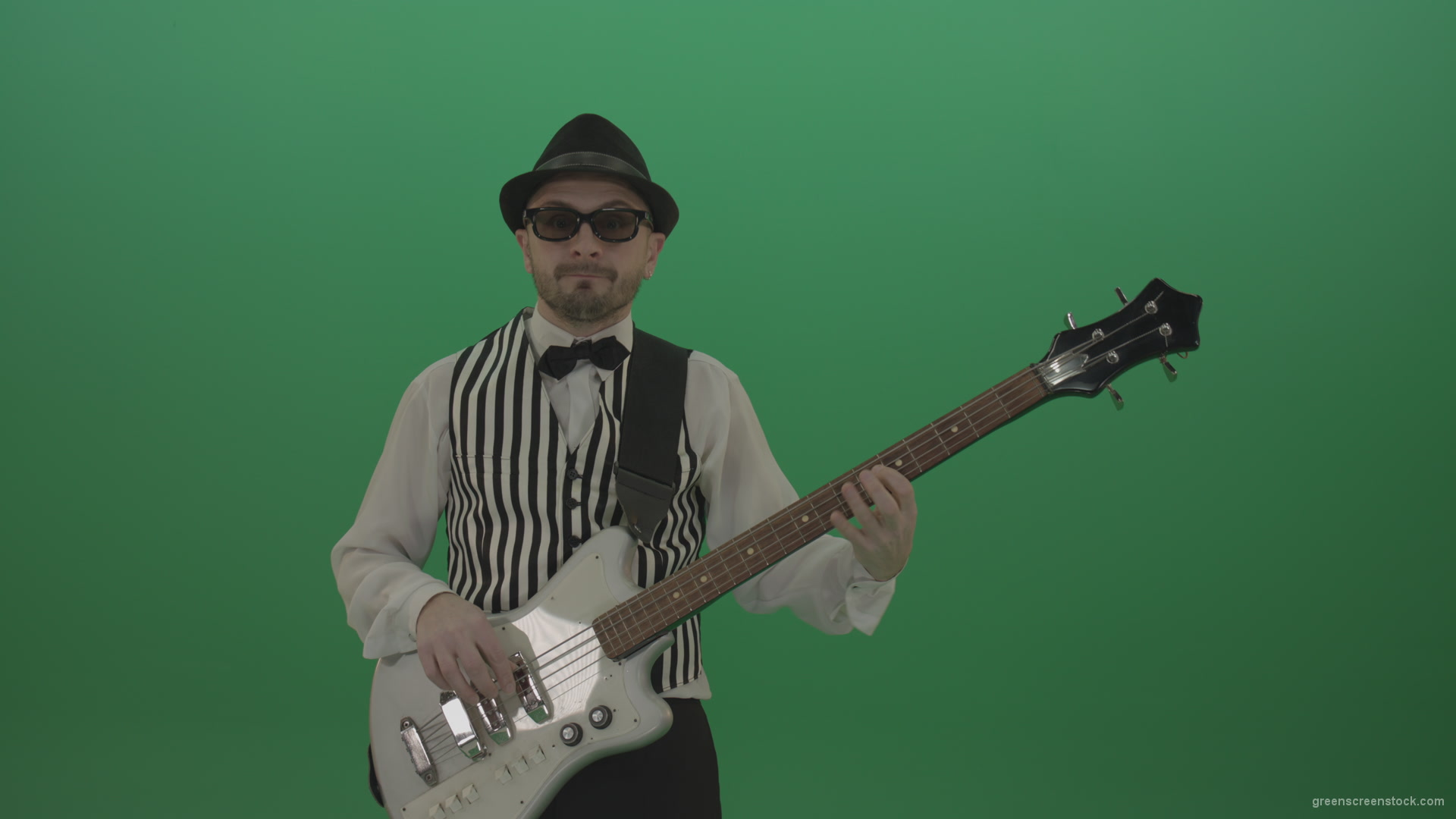 Guitar-player-browses-the-bass-guitar-playing-solo-and-charismatically-shows-facial-expressions_006 Green Screen Stock