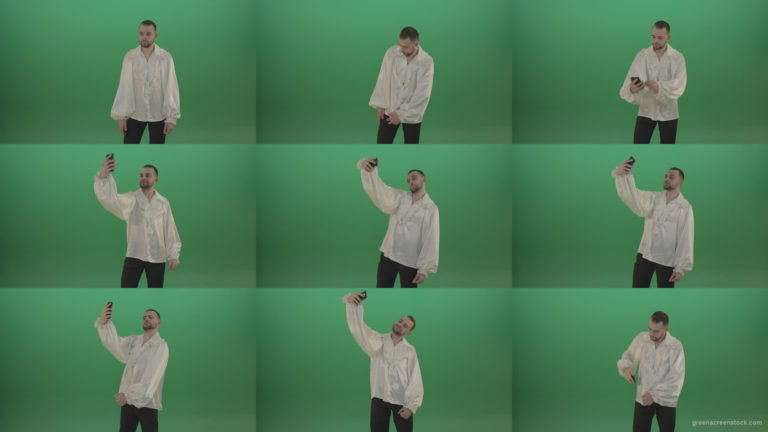 Guy-makes-a-selphi-and-posing-to-the-camera-isolated-on-green-screen Green Screen Stock