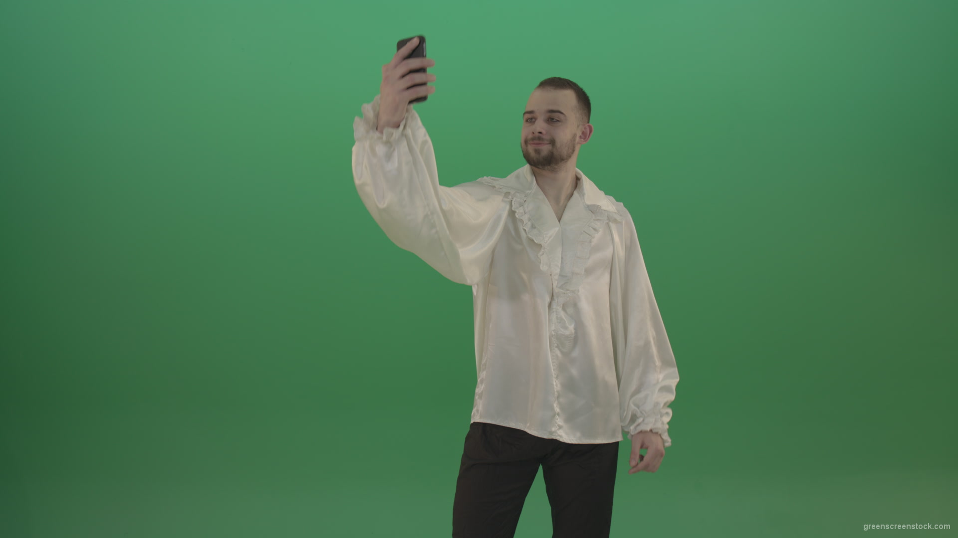 Guy-makes-a-selphi-and-posing-to-the-camera-isolated-on-green-screen_004 Green Screen Stock
