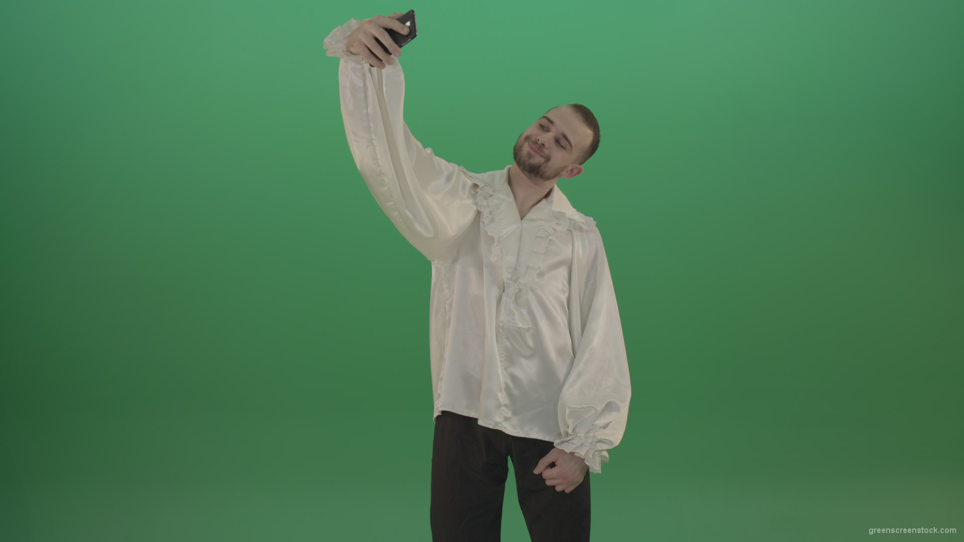 Guy-makes-a-selphi-and-posing-to-the-camera-isolated-on-green-screen_008 Green Screen Stock