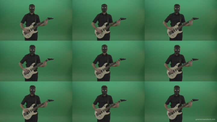 Hard-rock-guitarist-man-playing-white-guitar-in-black-mask-isolated-on-green-background Green Screen Stock