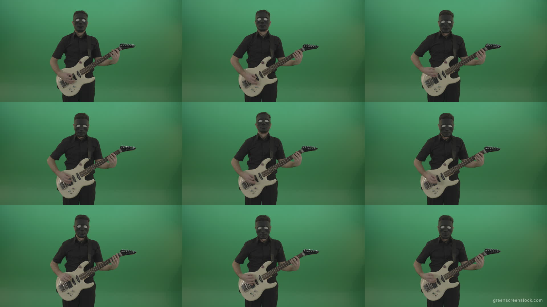 Hard-rock-guitarist-man-playing-white-guitar-in-black-mask-isolated-on-green-background Green Screen Stock