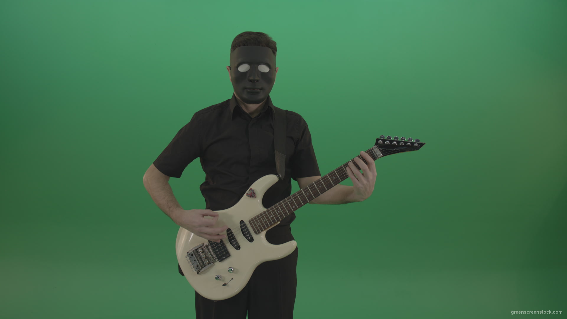 vj video background Hard-rock-guitarist-man-playing-white-guitar-in-black-mask-isolated-on-green-background_003