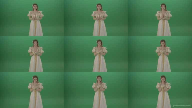 Hopes-for-victory-and-sincerely-believes-the-girl-to-show-emotions-isolated-on-green-background Green Screen Stock
