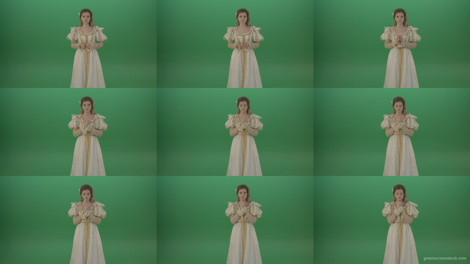 Hopes-for-victory-and-sincerely-believes-the-girl-to-show-emotions-isolated-on-green-background Green Screen Stock