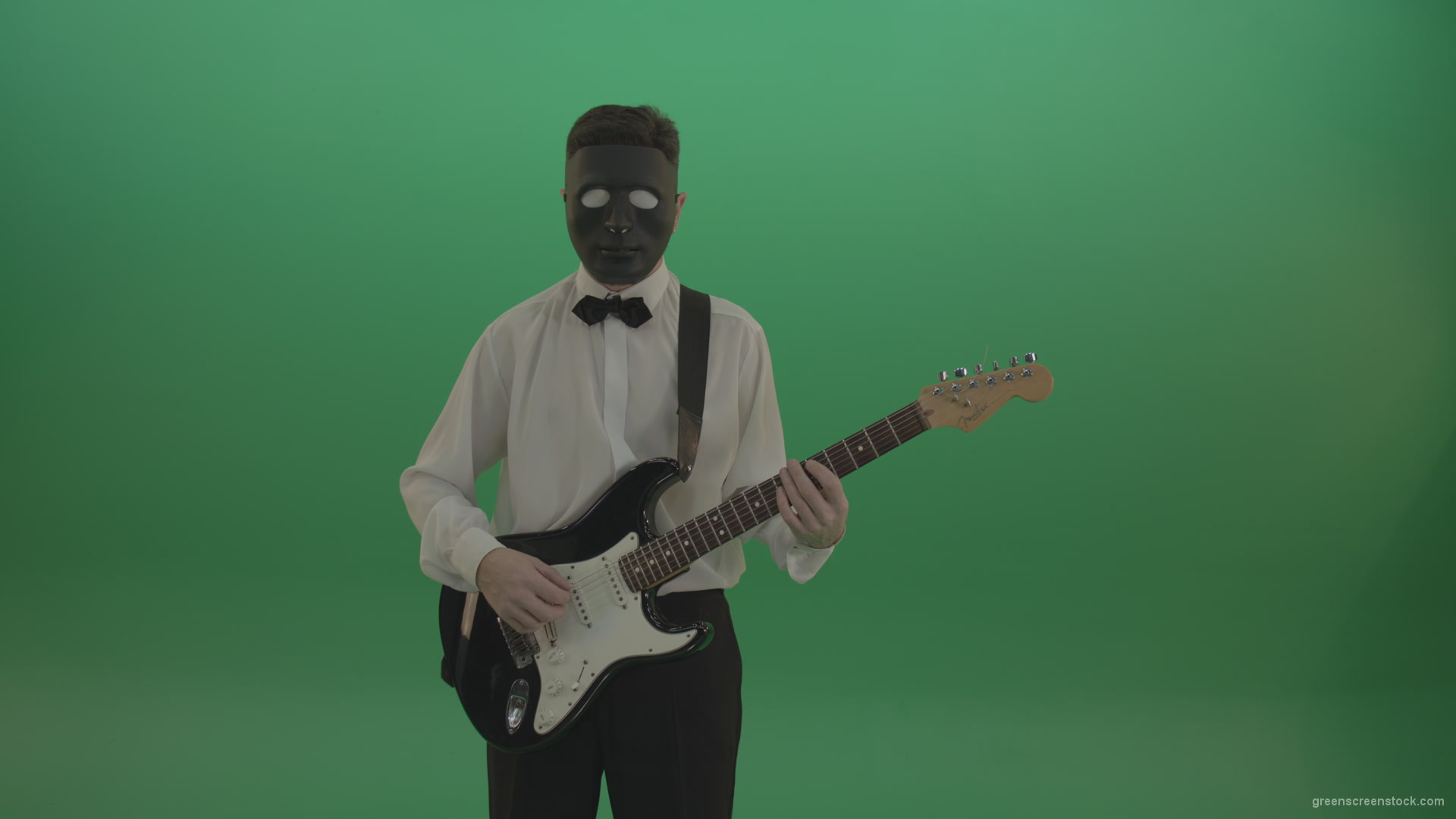 Horror-classic-guitarist-man-in-black-mask-and-white-shirt-play-guitar-on-green-screen_001 Green Screen Stock