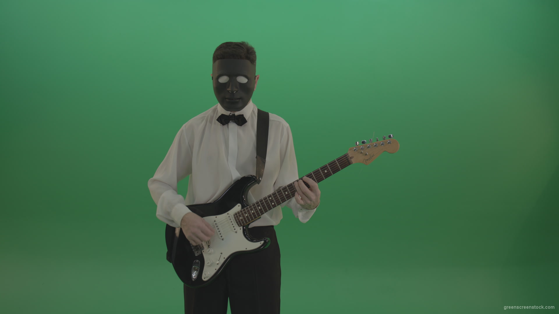 Horror-classic-guitarist-man-in-black-mask-and-white-shirt-play-guitar-on-green-screen_002 Green Screen Stock