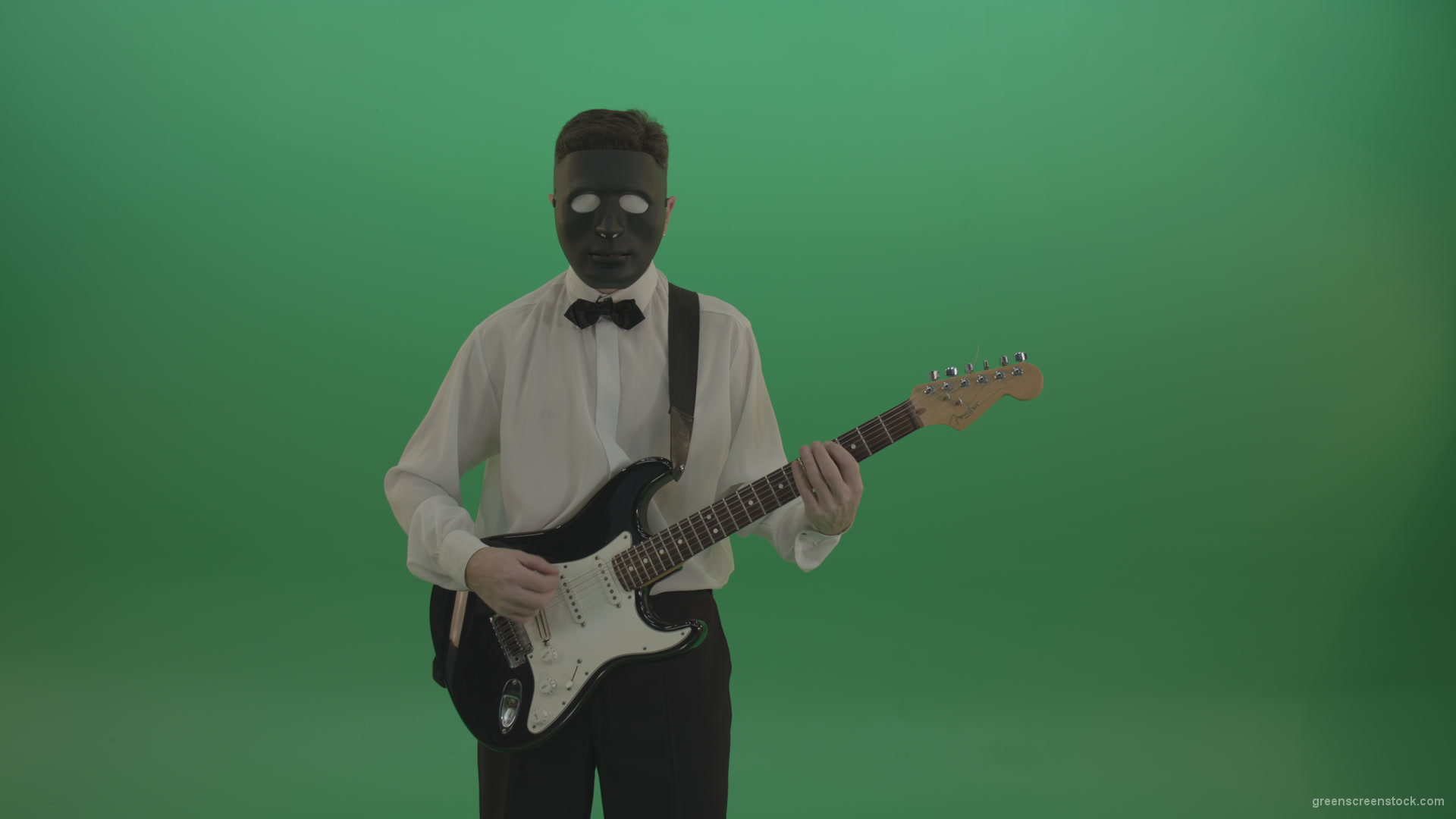 Horror-classic-guitarist-man-in-black-mask-and-white-shirt-play-guitar-on-green-screen_006 Green Screen Stock