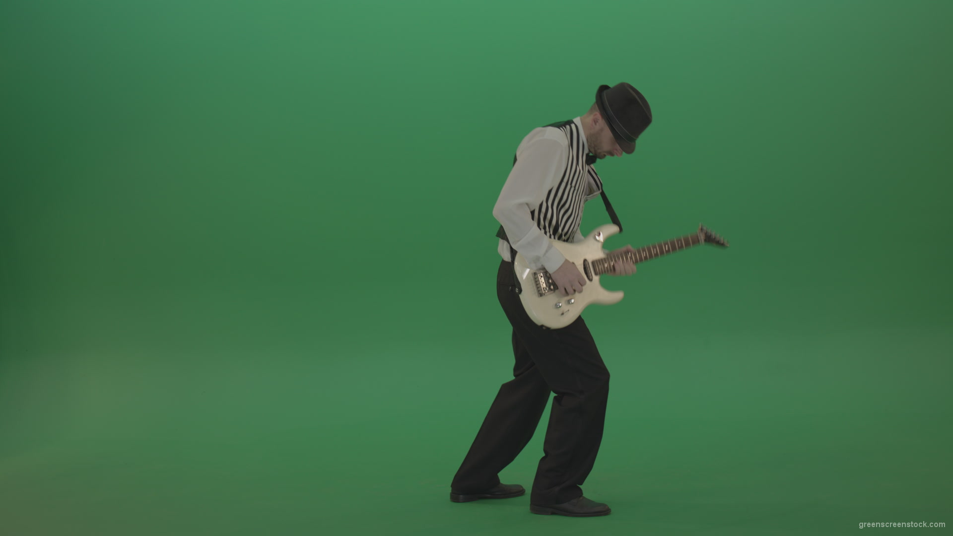 Jazz-man-musician-play-guitar-solo-music-in-guitar-on-green-screen-isolated-in-side-view_005 Green Screen Stock
