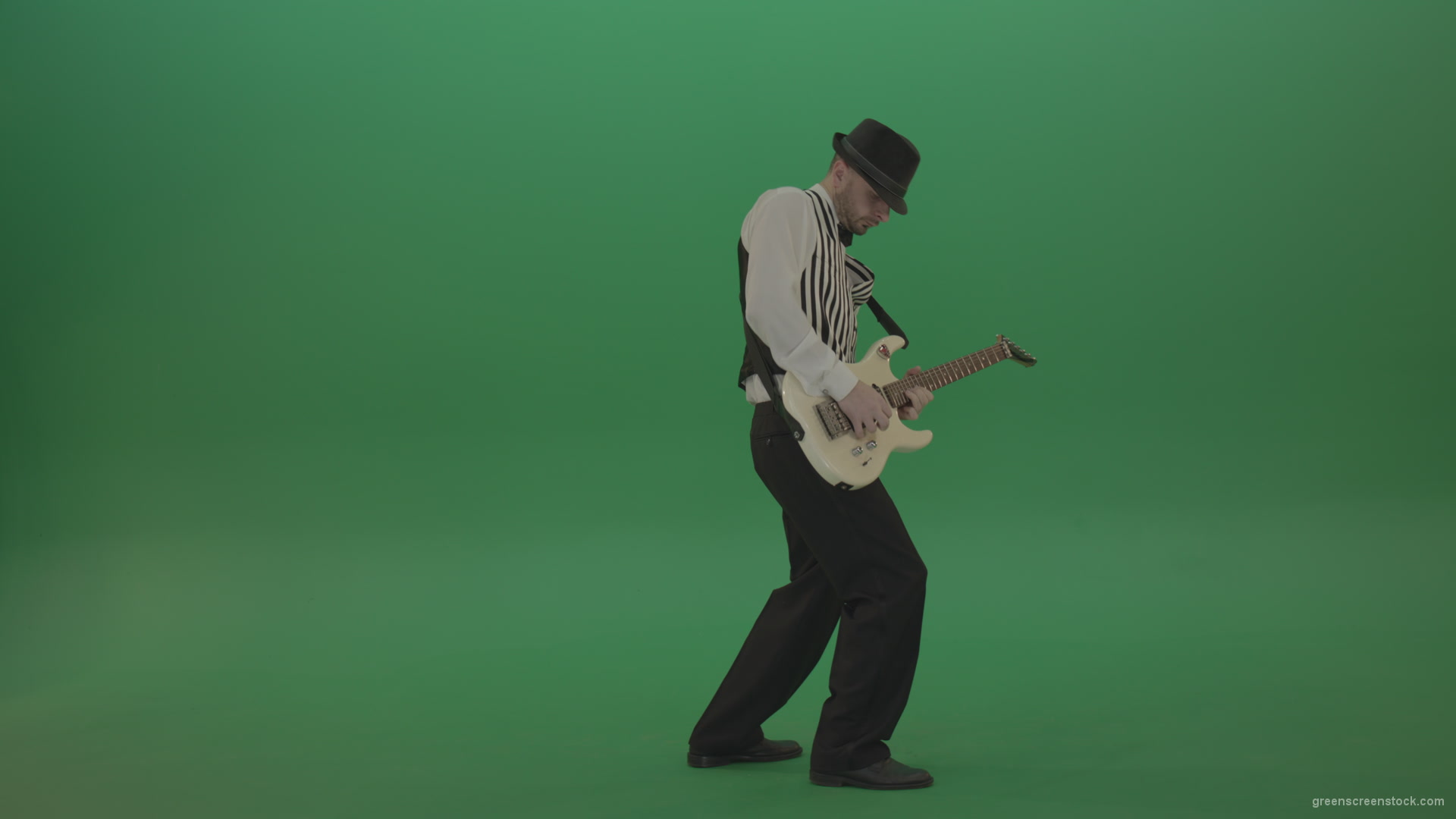 Jazz-man-musician-play-guitar-solo-music-in-guitar-on-green-screen-isolated-in-side-view_006 Green Screen Stock