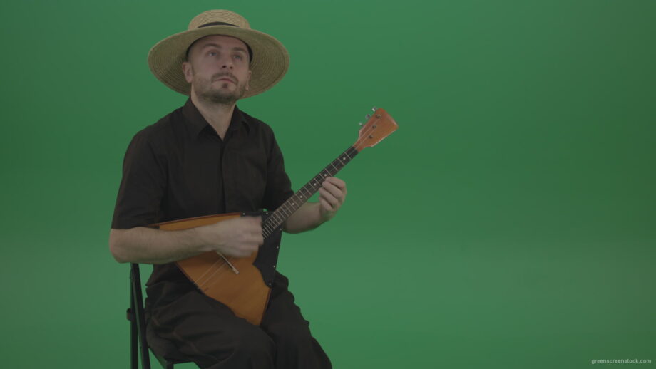 vj video background Man-from-village-play-Balalaika-music-instrument-isolated-on-green-screen_003