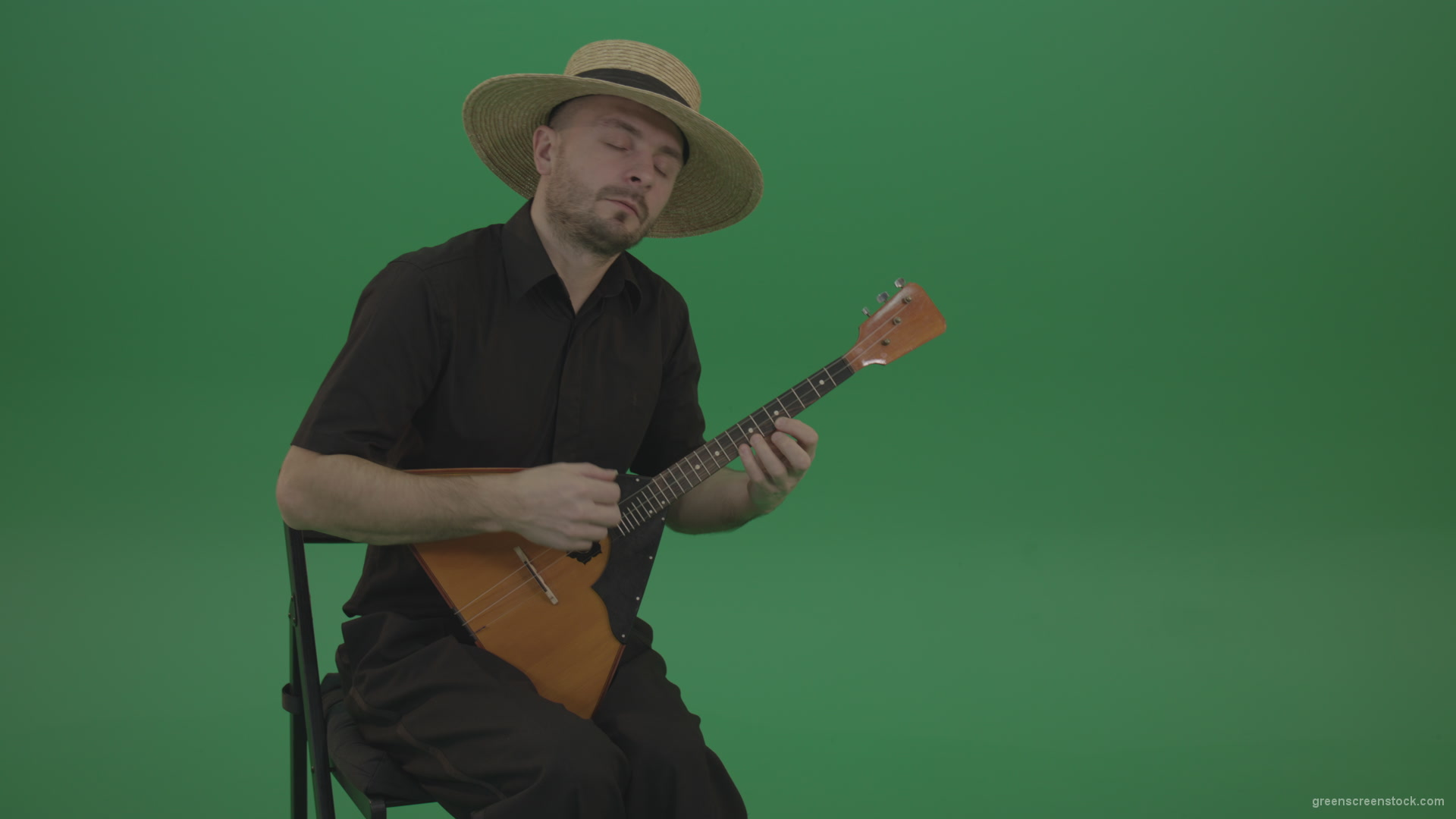 Man-from-village-play-Balalaika-music-instrument-isolated-on-green-screen_004 Green Screen Stock
