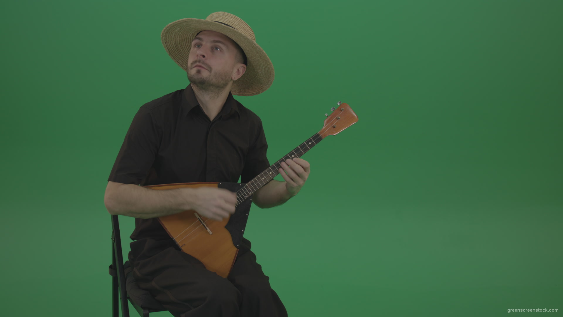 Man-from-village-play-Balalaika-music-instrument-isolated-on-green-screen_006 Green Screen Stock